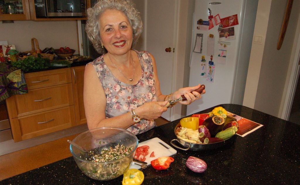 Cecile Yazbek preparing some of the scrumptious food she's encountered on her adventurous life.